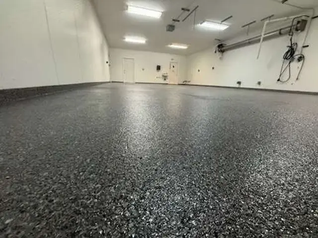 After: Cracked Shop Slab To Charcoal Flake, a finished 541 Breezin coating